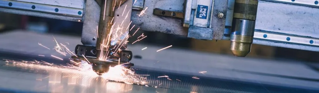 Sparks flying from a plasma cutter cutting sheet metal