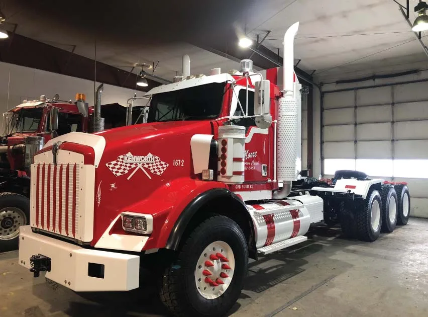 Red semi truck with a powder coated finish in the LSM shop