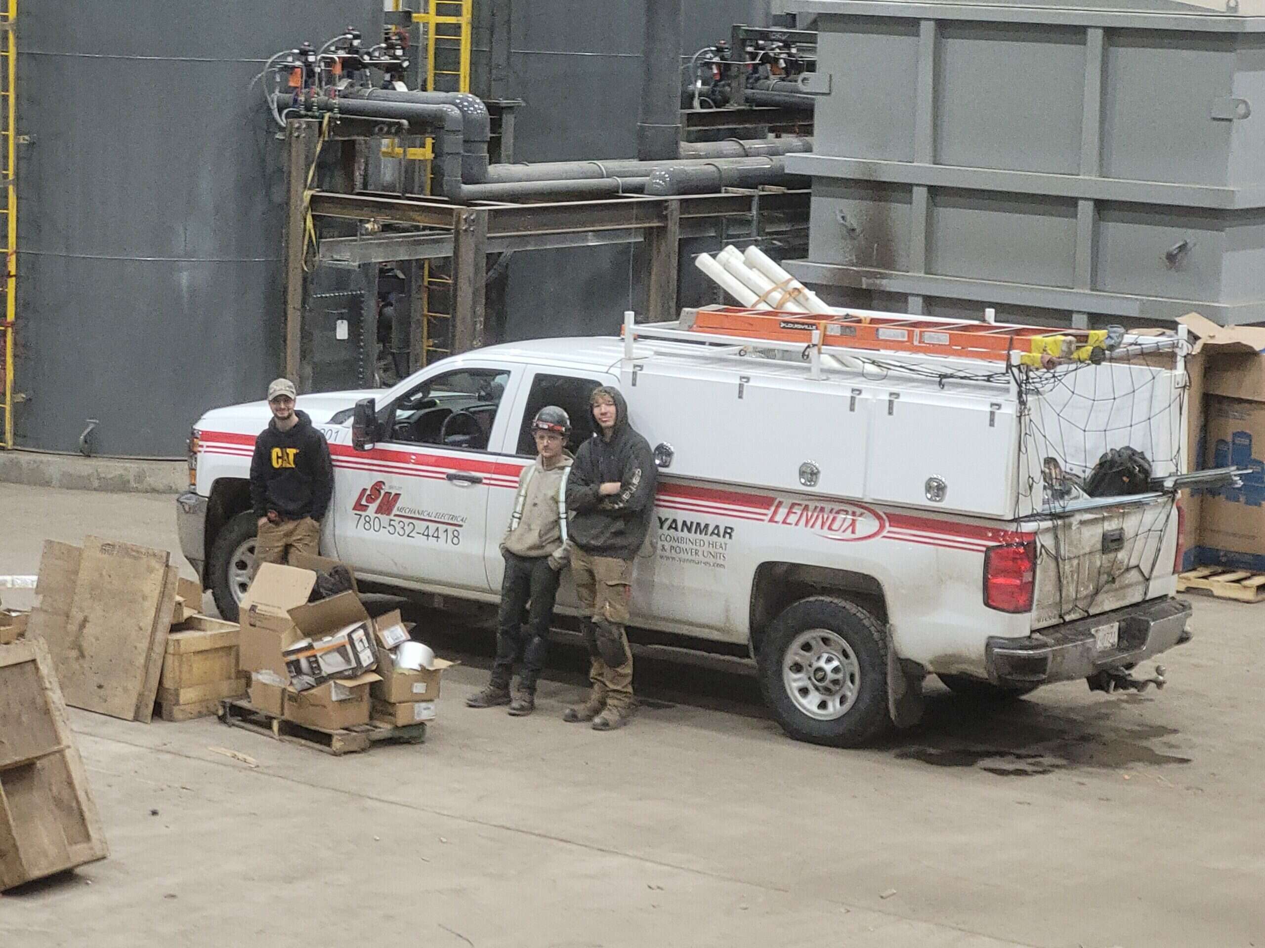 commercial hvac workers on site